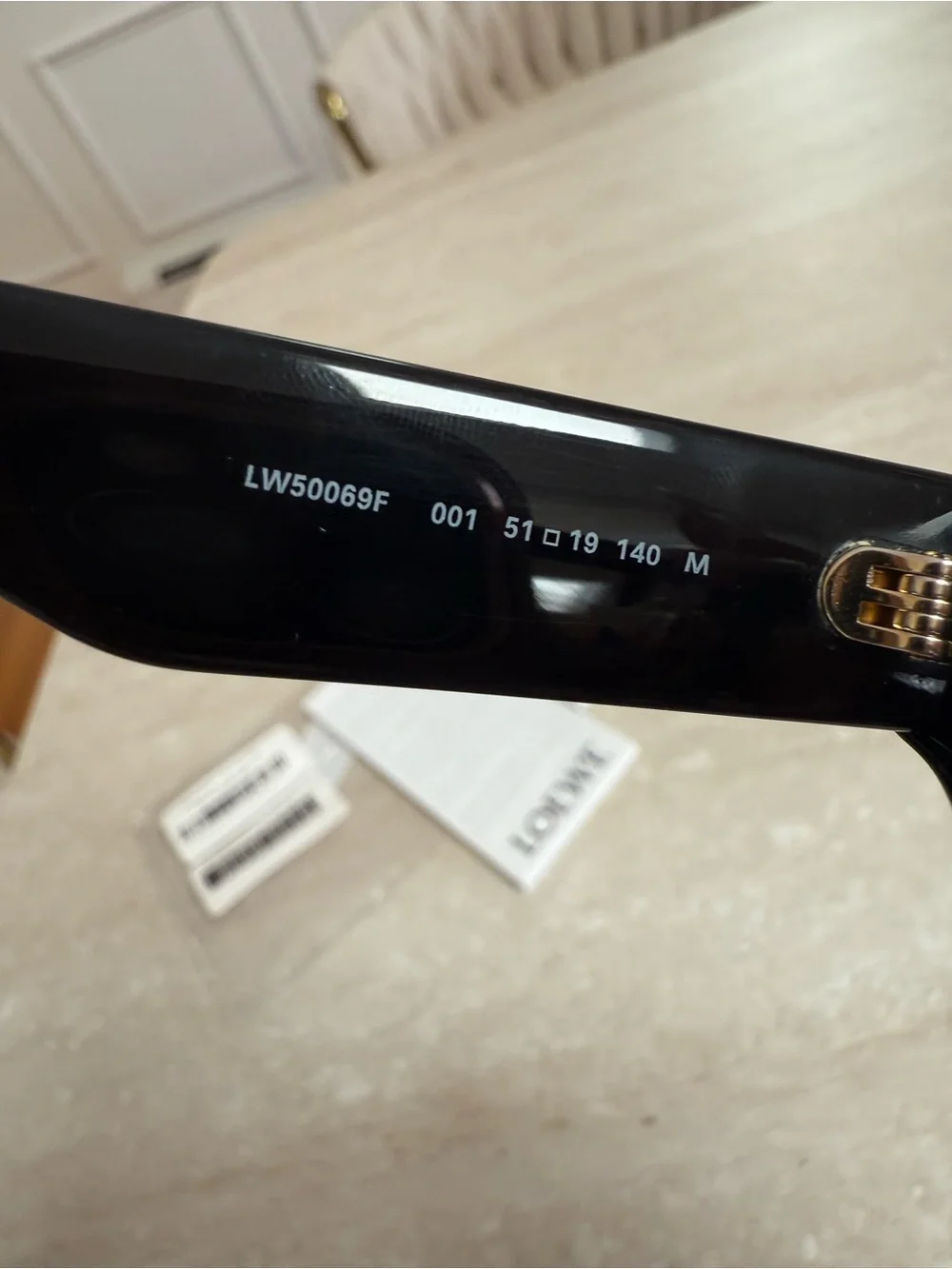 Loewe Black Glasses with Gold Anagram Logo.